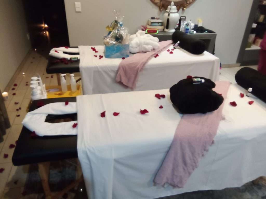Client receiving relaxing massage at home from mobile therapist in Midrand